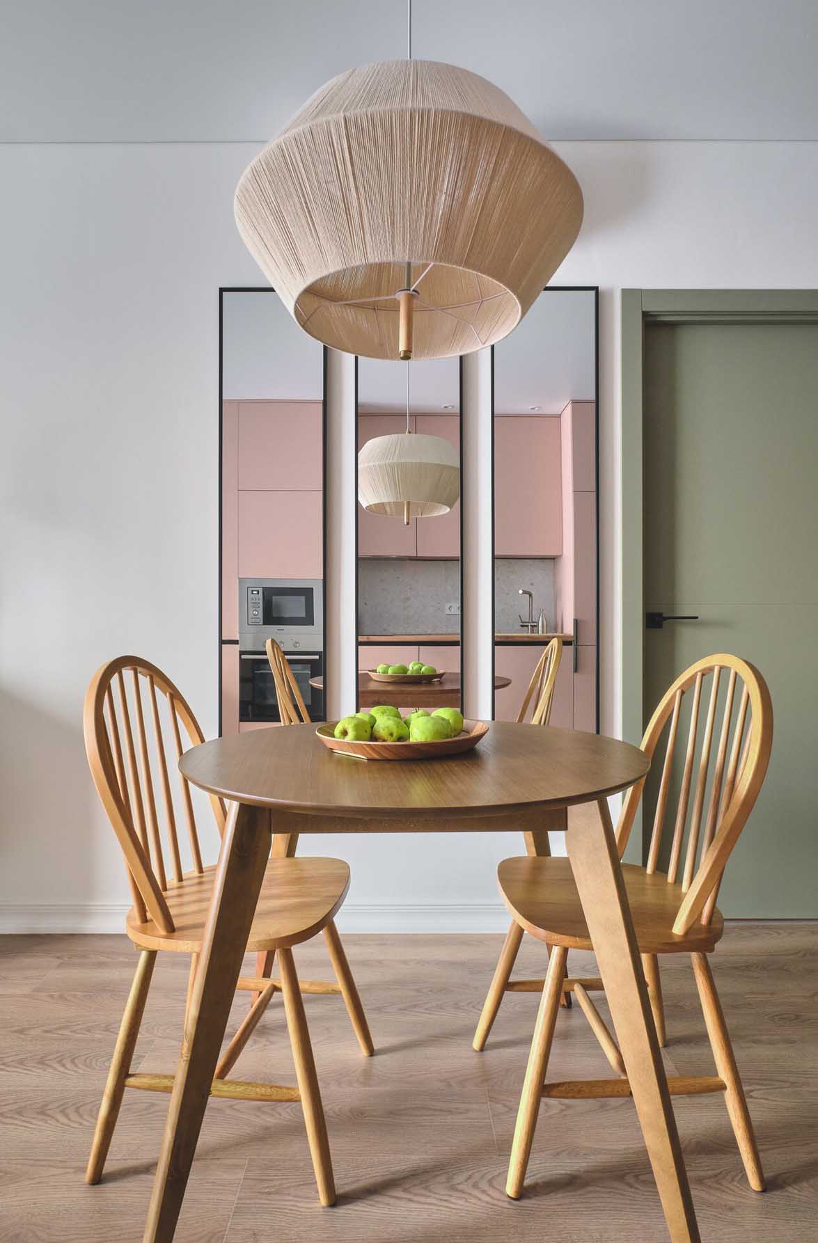 pink kitchen dining room in a two-room 42sqm apartment