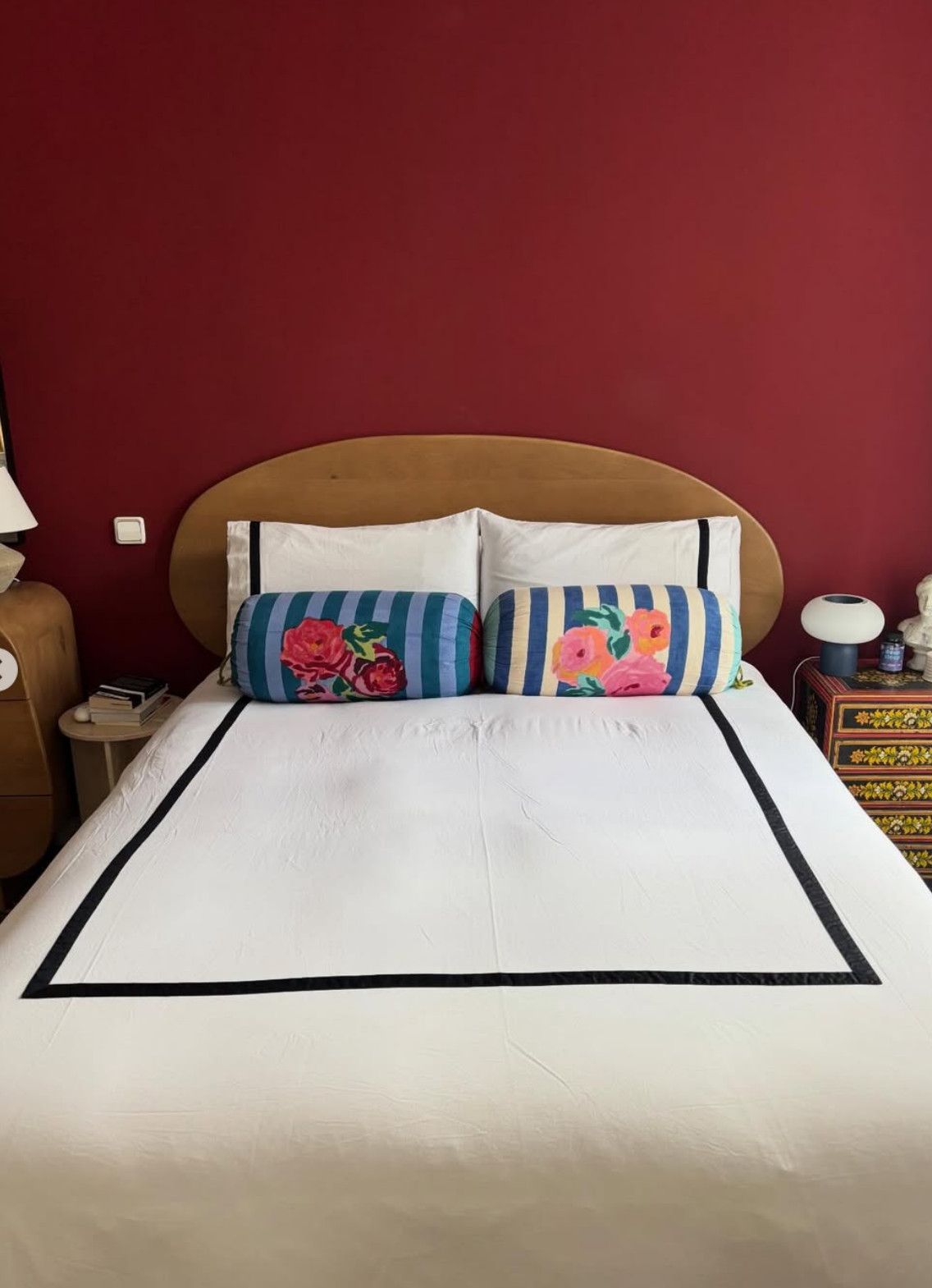 bedroom with red accent wall furnished by Sklum at Elena Cuesta's