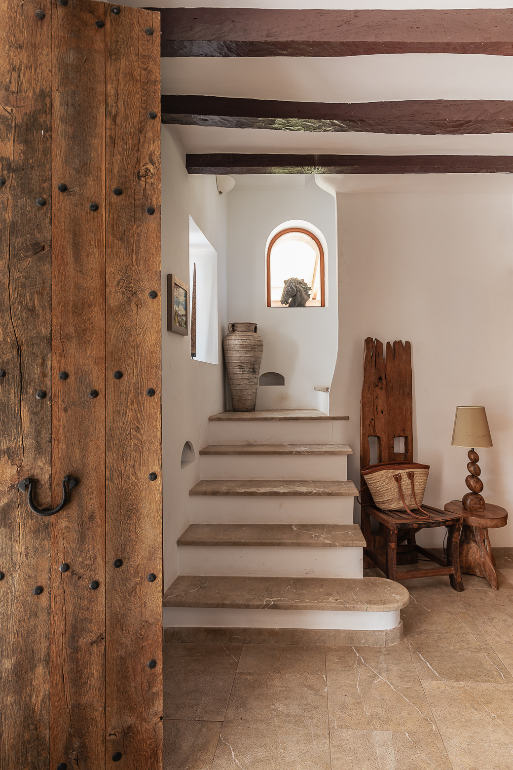 entryway with old door and stairs