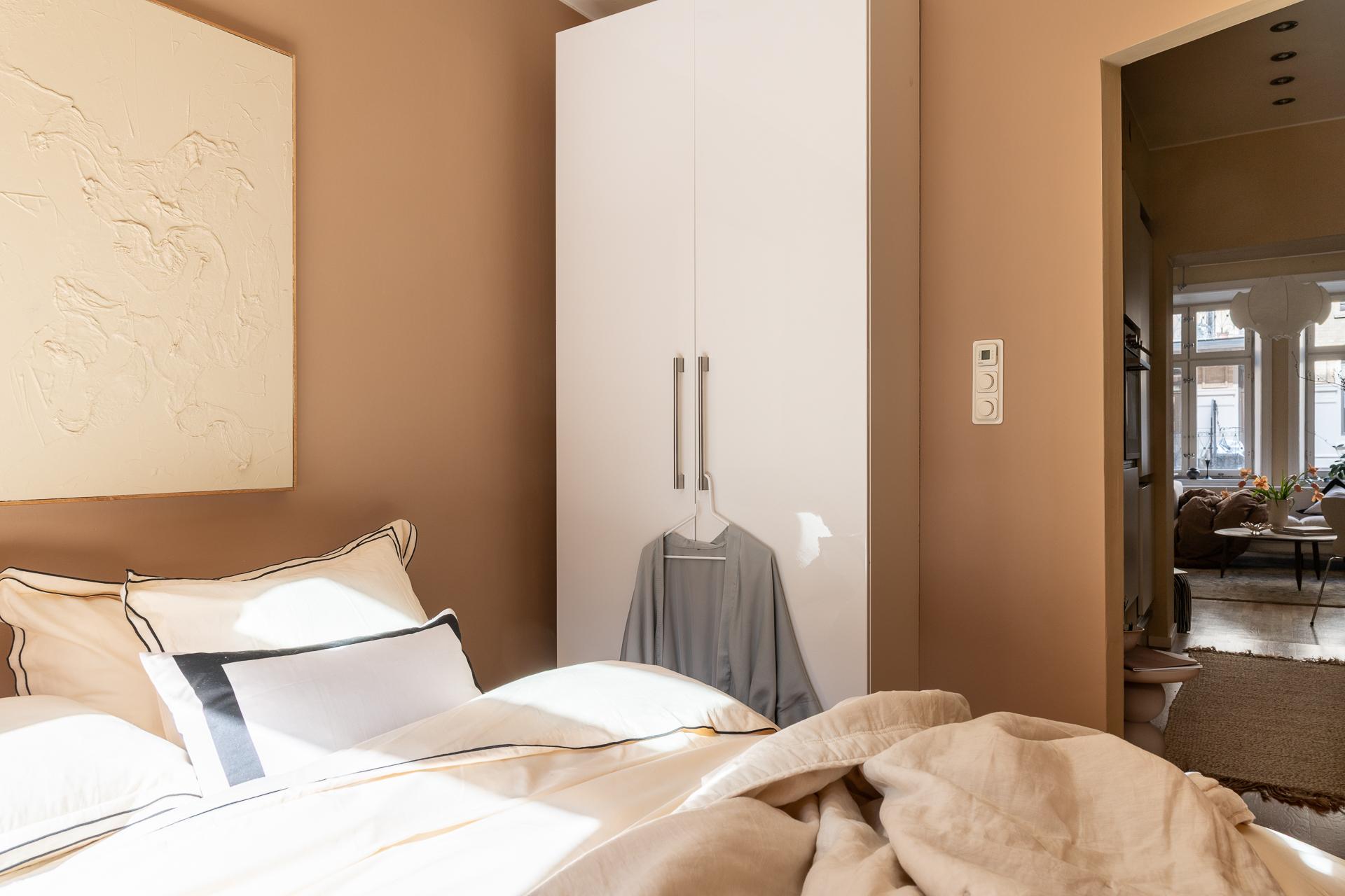 bedroom with walls in light brown shade