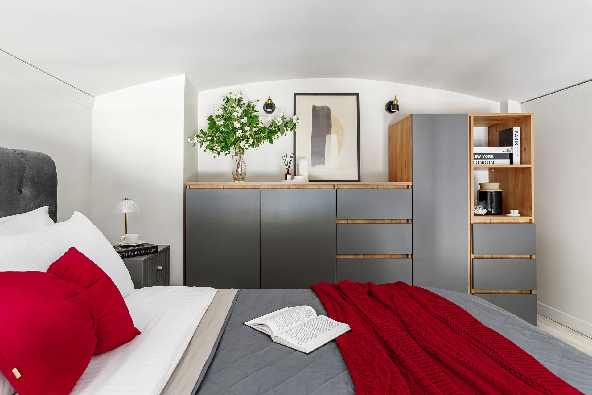 gray and red bedroom on mezzanine