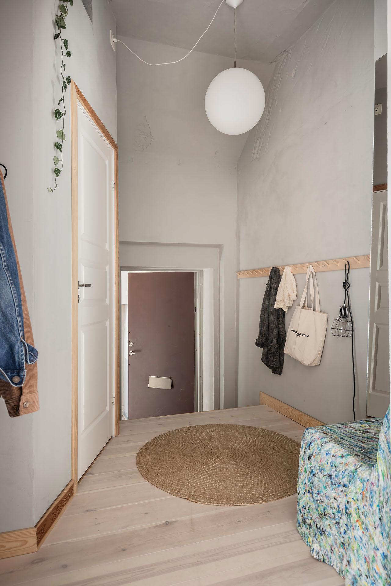 entrée avec fauteuil appartement 80m2 décoration scandinave entrée avec fauteuil appartement 80m2 décoration scandinave