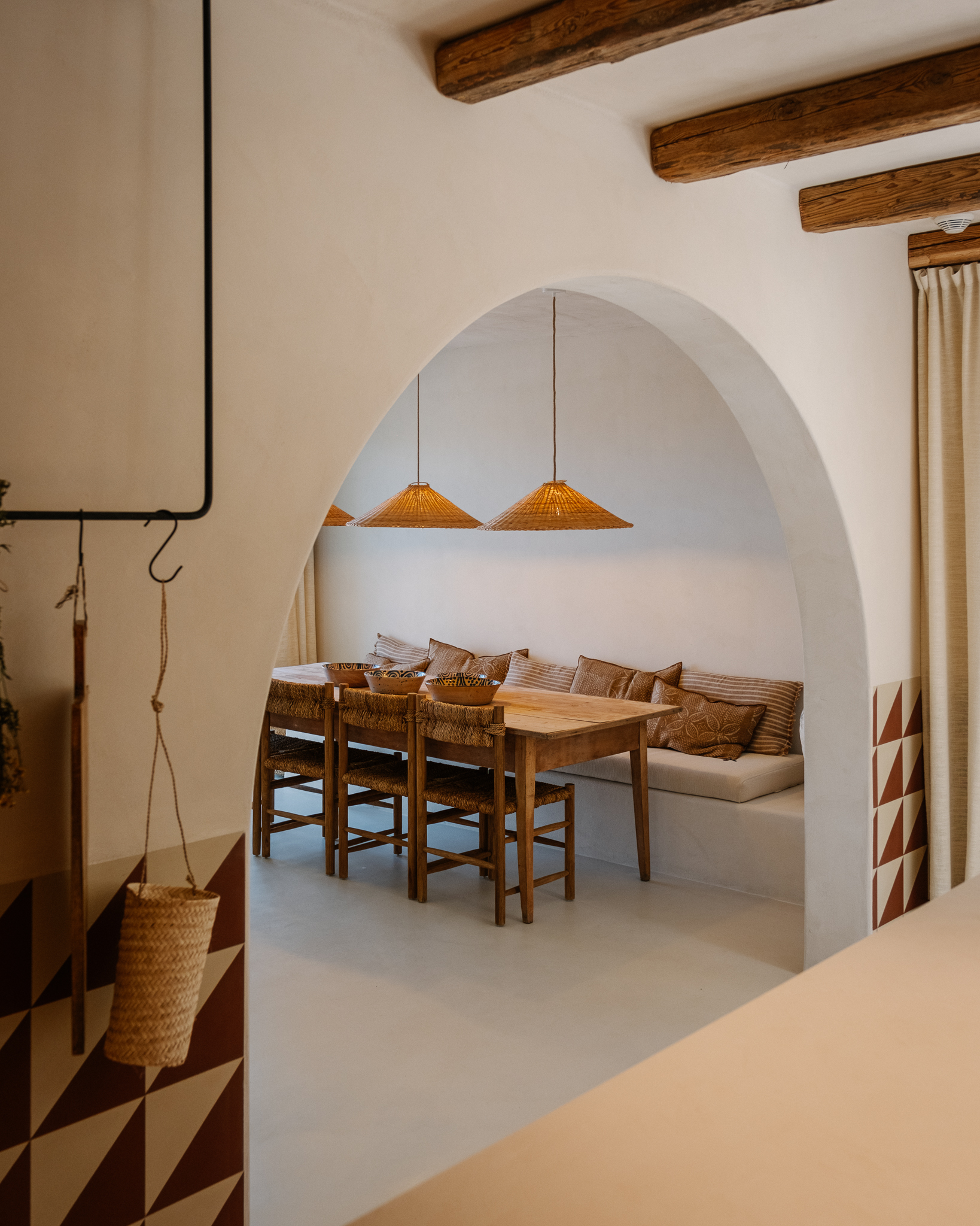 dining room with arch
