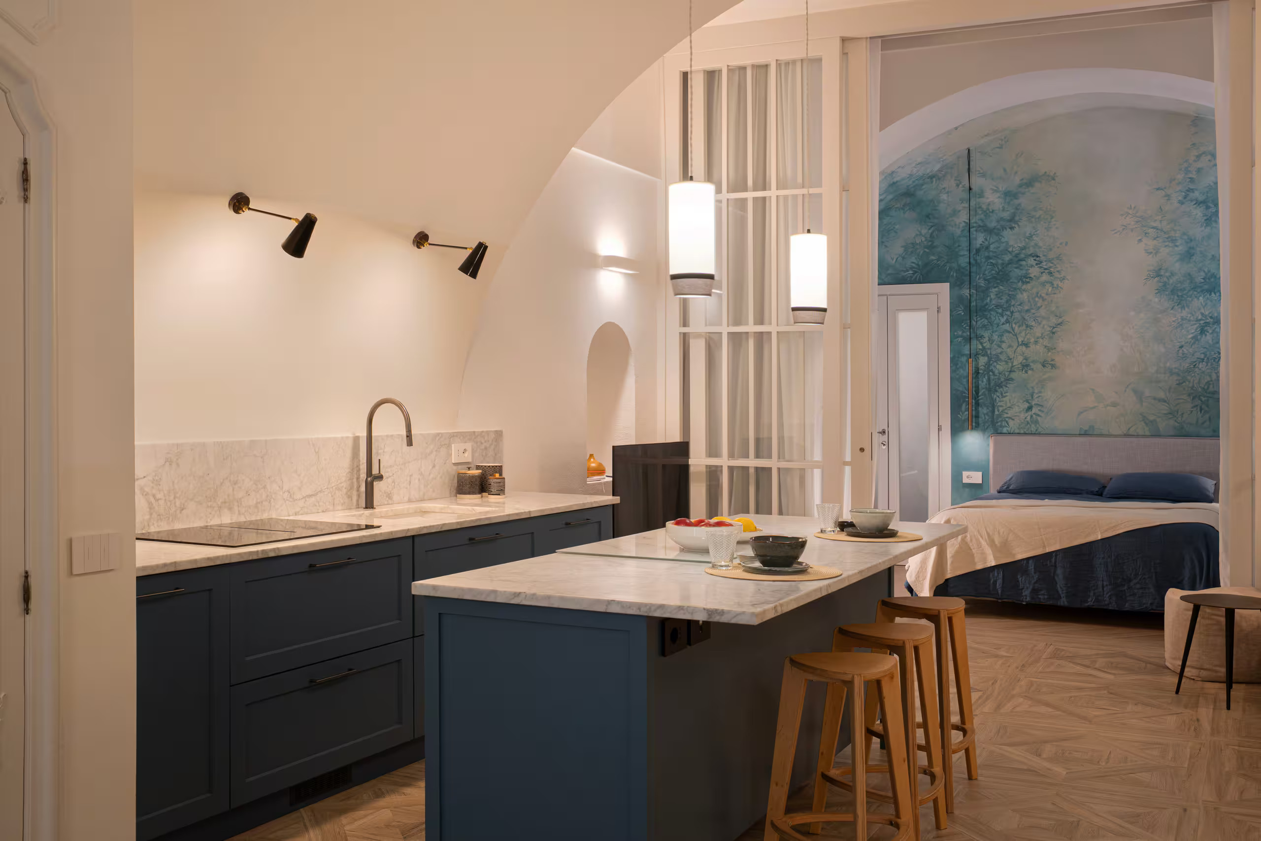 blue kitchen with arched entrance and vaults historic artist’s home Cagliari contemporary decor Dimora LAJ blue kitchen with arched entrance and vaults historic artist’s home Cagliari contemporary decor Dimora LAJ