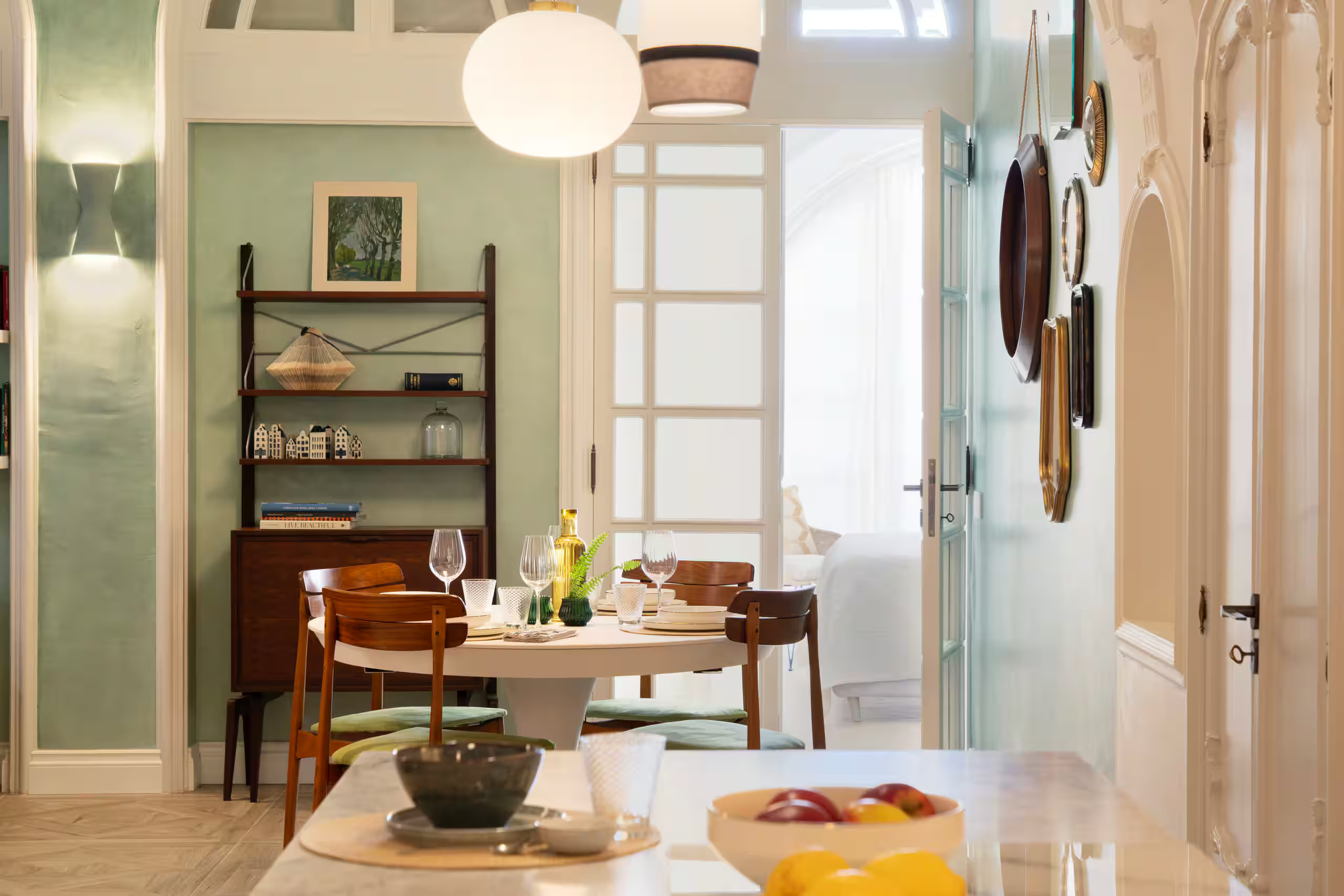 mid century dining room with green walls historic artist’s home Cagliari contemporary decor Dimora LAJ mid century dining room with green walls historic artist’s home Cagliari contemporary decor Dimora LAJ