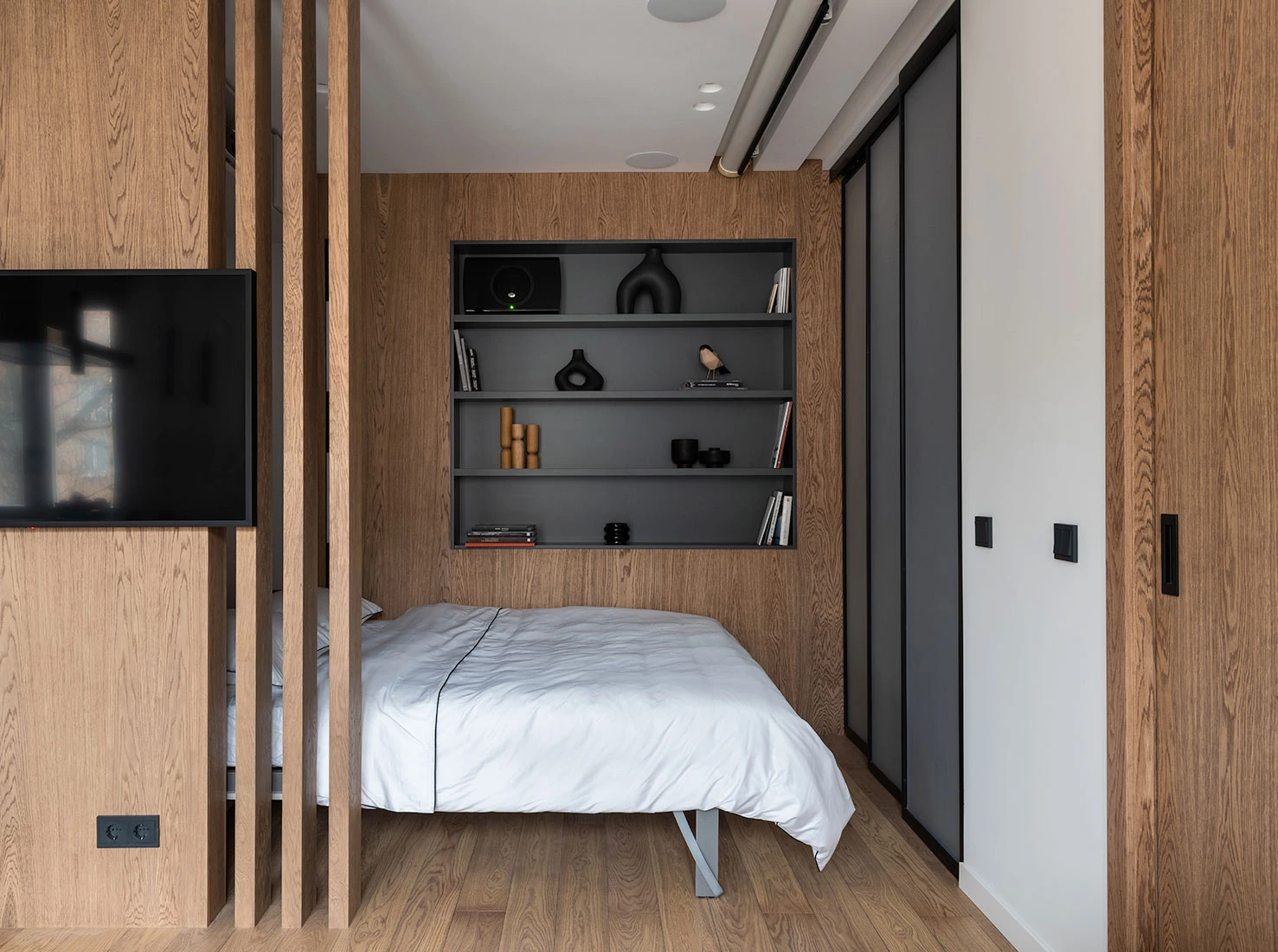 espace chambre avec lit escamotable décoration contemporaine petit appartement de 46m2
