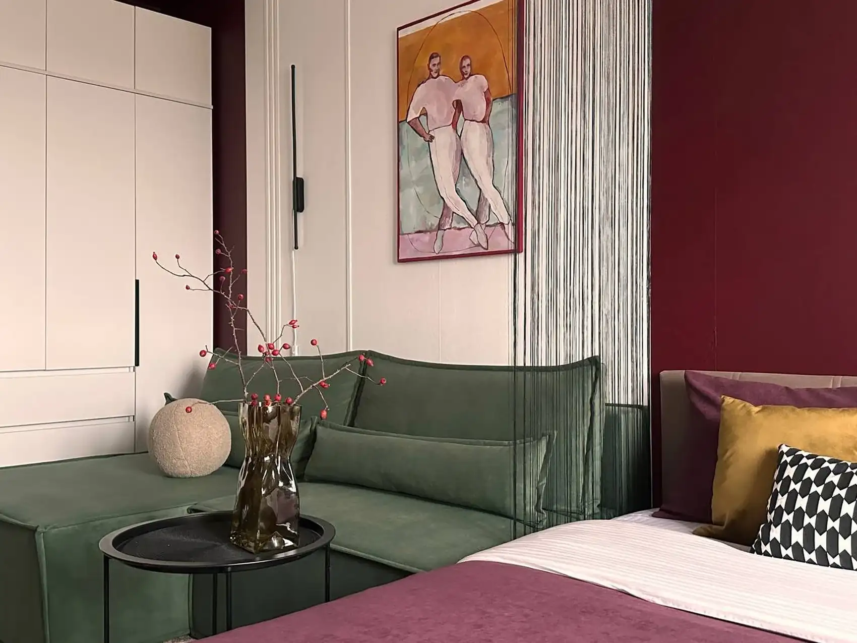 living room and bedroom with colour blocking in green and burgundy 37sqm studio contemporary decor living room and bedroom with colour blocking in green and burgundy 37sqm studio contemporary decor