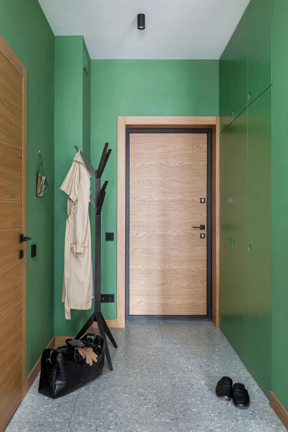 entryway with green walls and terrazzo floor entryway with green walls and terrazzo floor