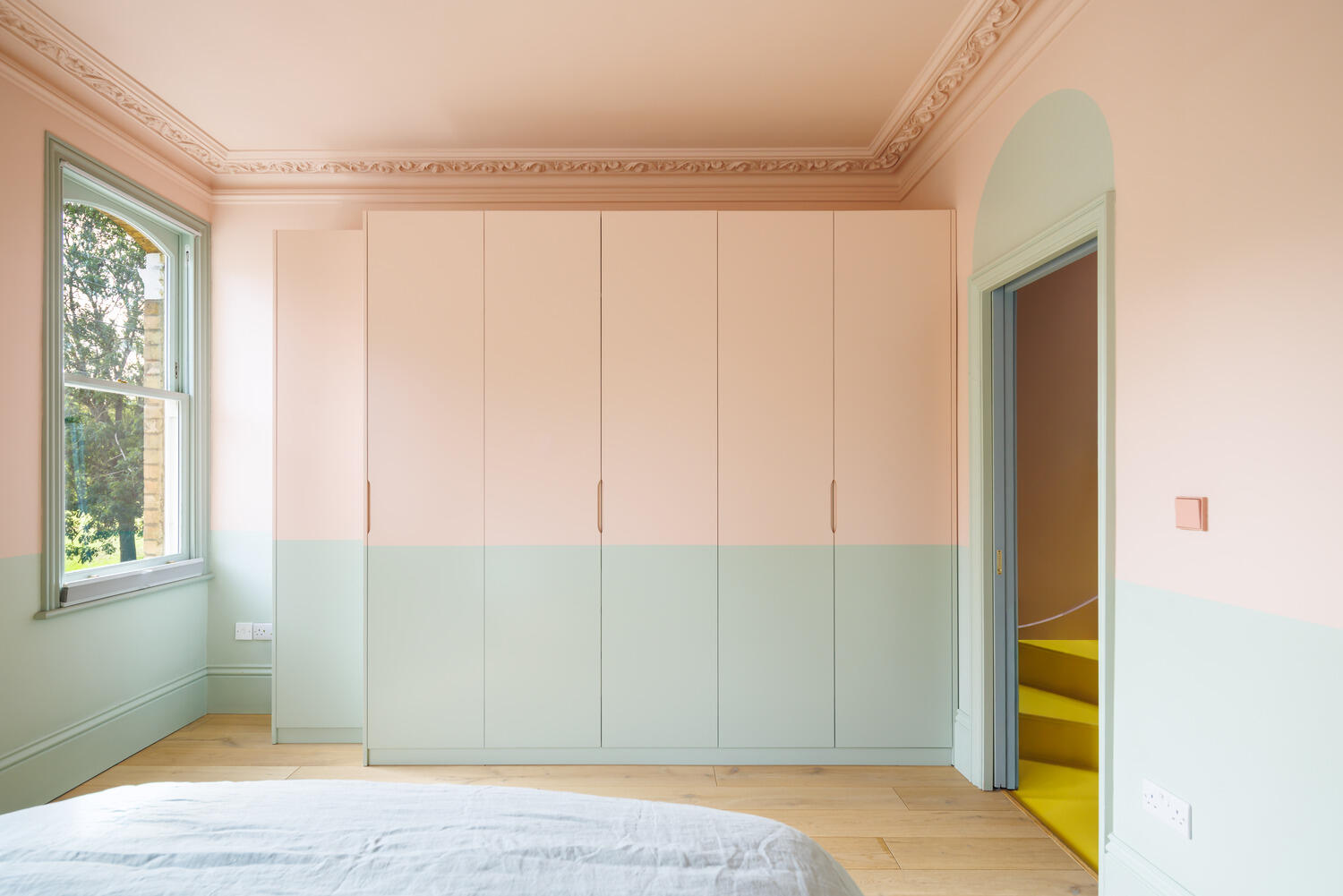 green and pink bedroom coloured decor Victorian house in London green and pink bedroom coloured decor Victorian house in London
