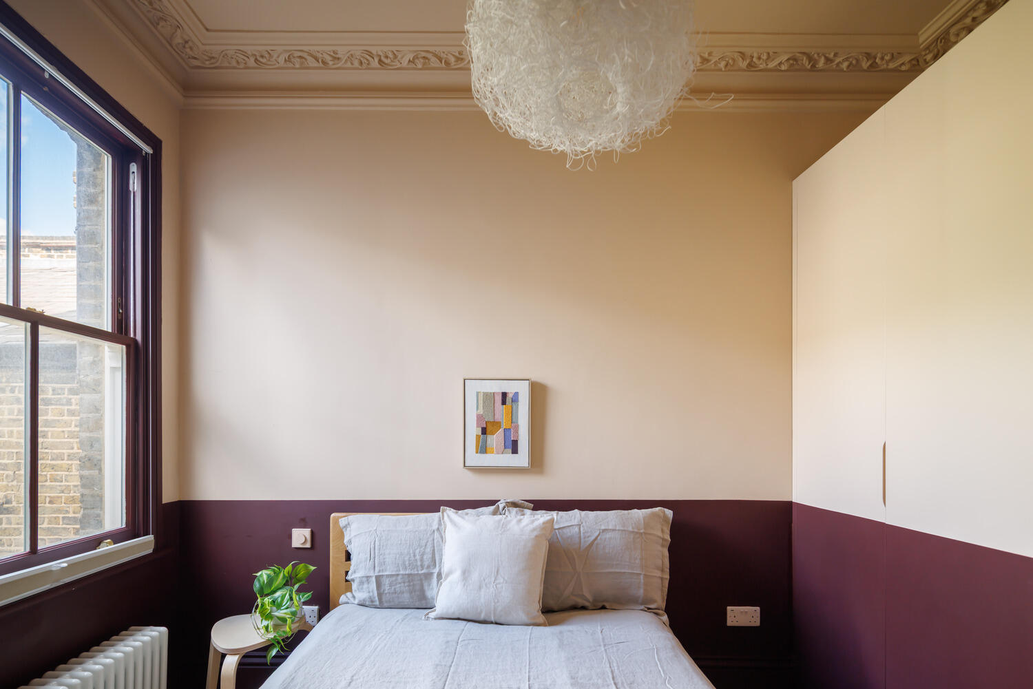 beige and burgundy bedroom coloured decor Victorian house in London beige and burgundy bedroom coloured decor Victorian house in London