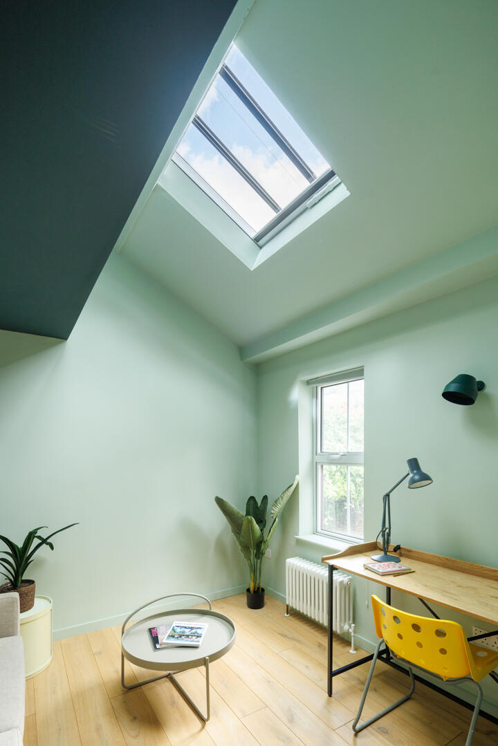 green home office with zenithal window coloured decor Victorian house in London green home office with zenithal window coloured decor Victorian house in London