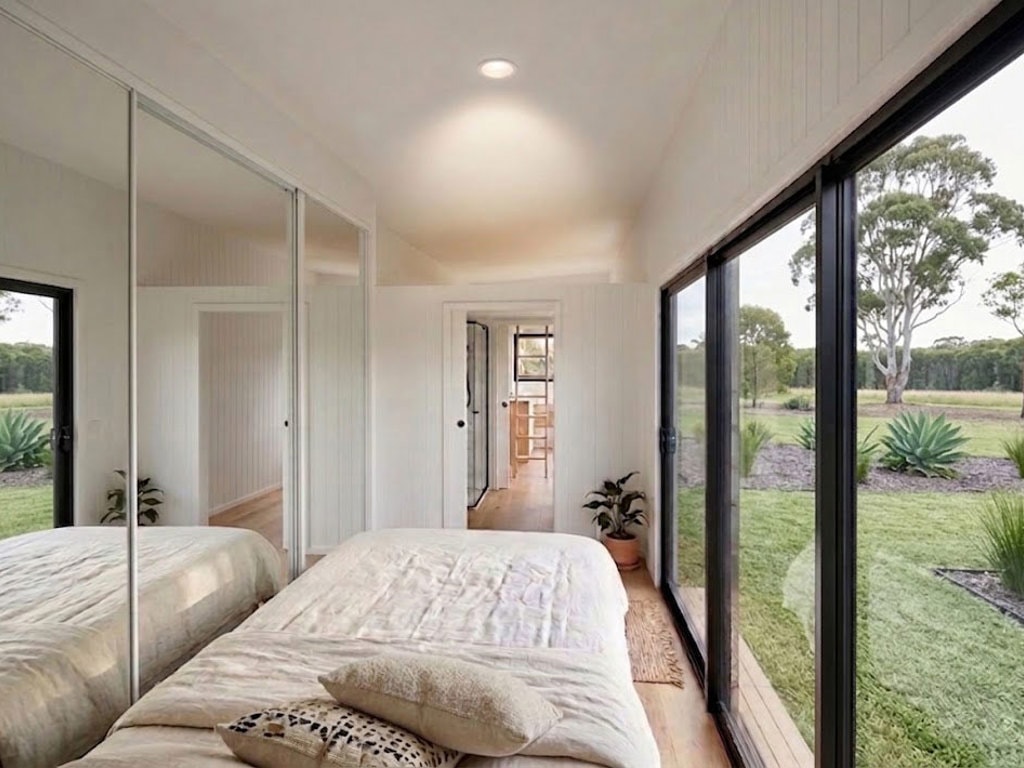 bedroom with mirrored cupboards