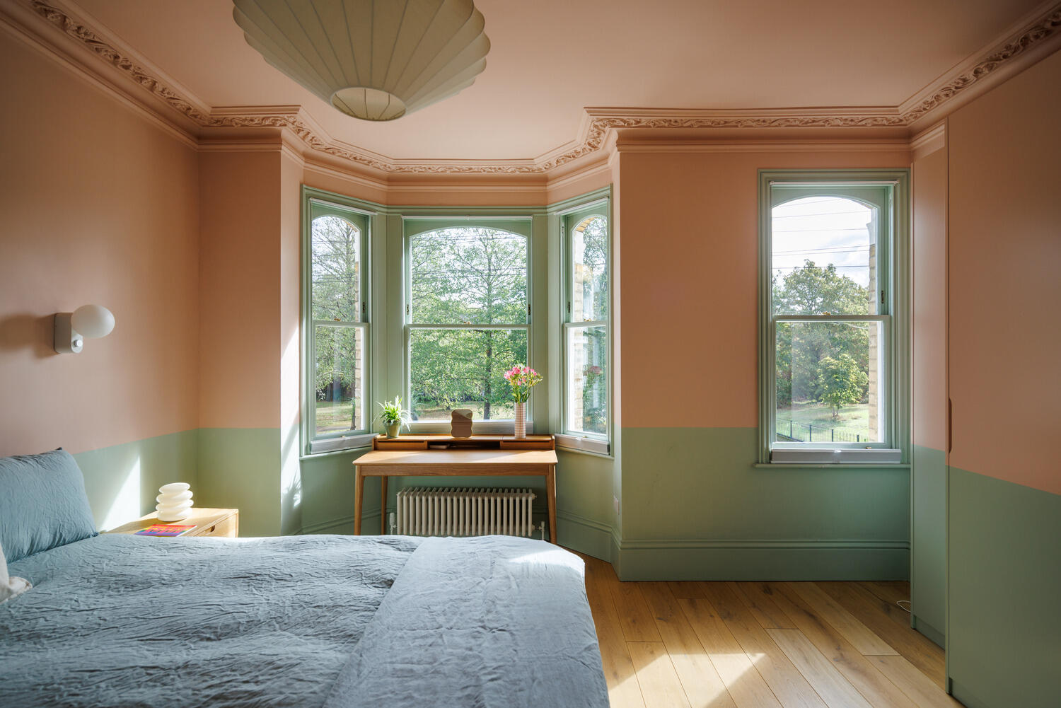 green and pink bedroom coloured decor Victorian house in London green and pink bedroom coloured decor Victorian house in London