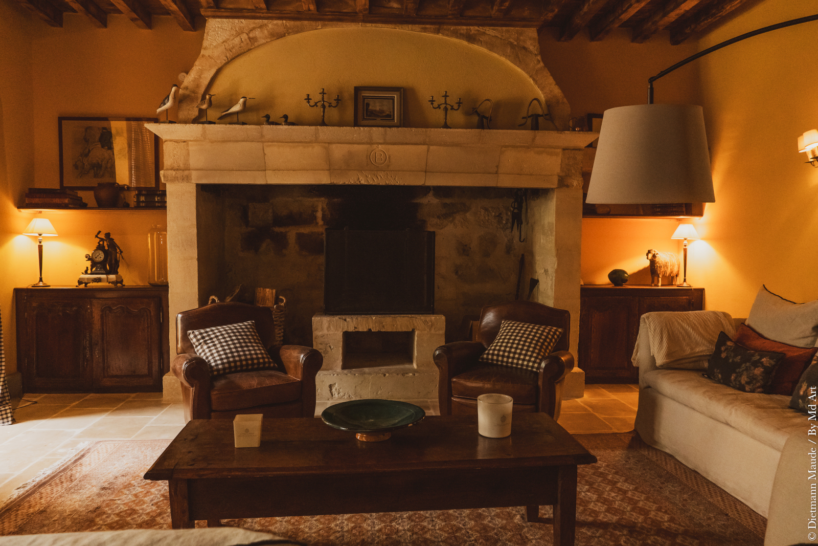 living room with beams and stone historic fireplace Provence living room with beams and stone historic fireplace Provence