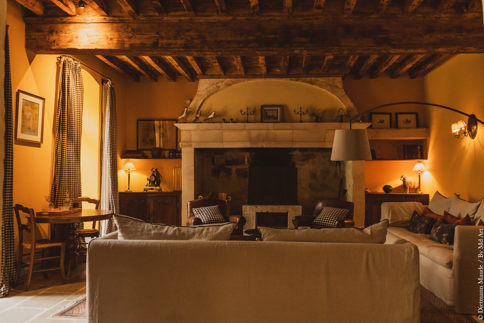 living room with beams and stone historic fireplace Provence living room with beams and stone historic fireplace Provence