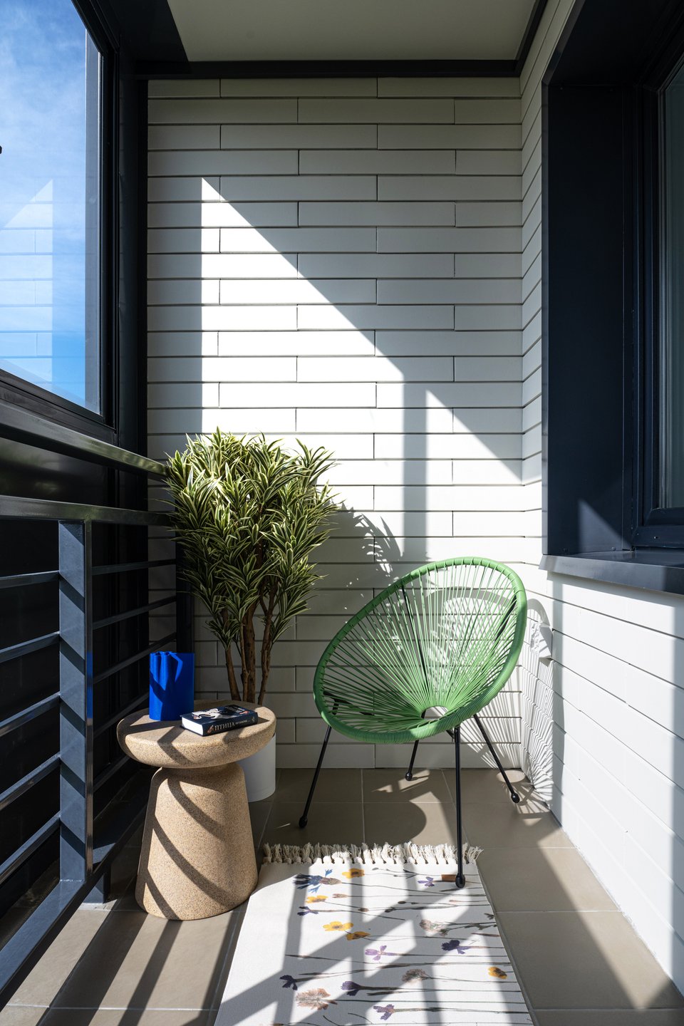 loggia fermée avec fauteuil acapulco vert
