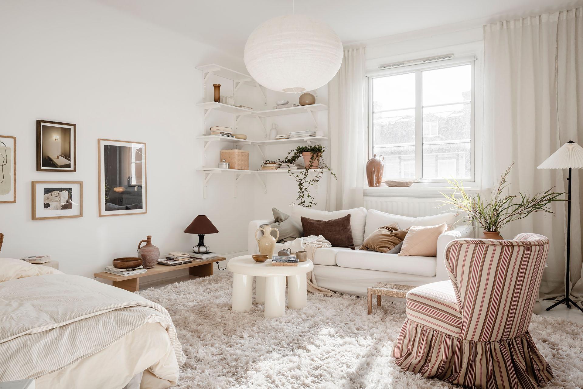 salon et coin chambre décoration scandinave blanche studio 27m2